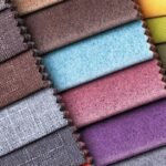 Vintage chair reupholstery fabric swatches showing different textures and durability options for antique furniture restoration